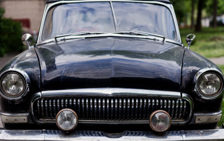 Vintage transport retro car. Black automobile. front view