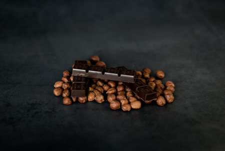 Organic garlic and knife on dark concrete background