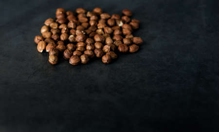 Delicious dark chocolate truffles with cinnamon and hazelnutsの写真素材