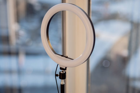 Facade of a modern high-rise apartment building over sky backgroundの写真素材