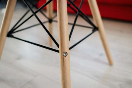 Brown leg of chair on floor. element modern chairの写真素材