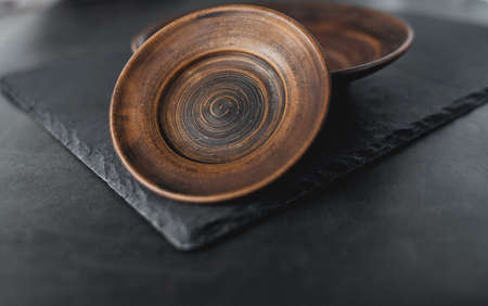 fragrant black pepper grain in a white bowl. seasoning for cooking meat and other food productsの写真素材