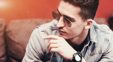 Fashion man in trendy clothes. handsome guyの写真素材