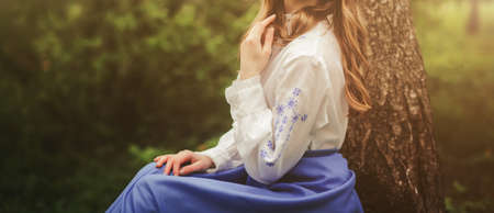 beautiful woman drinking coffee in city cafeの写真素材