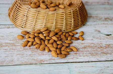 a group of peeled nuts on table. almonds organic food for vegetariansの写真素材
