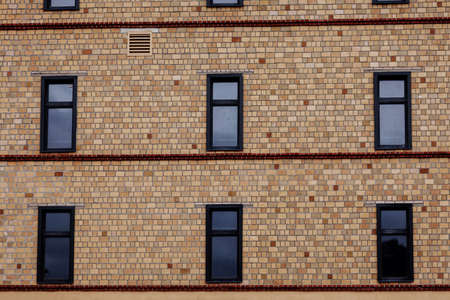 Old brick building with window. american exteriorの写真素材