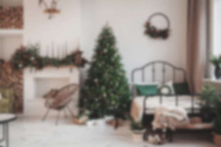 Living room with sofa, armchair, lamp and brick wallの写真素材