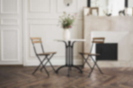 Living room with sofa, armchair, lamp and brick wallの写真素材