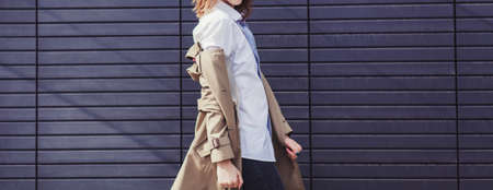 Stylish young happy couple in love smiling in streetの写真素材