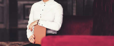 Cafe terrace in small European city. flowers in a jar on the table of a street restaurantの写真素材