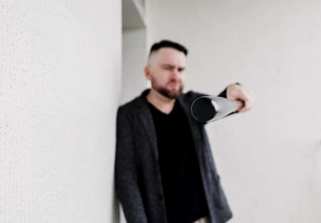photo of bearded guy smoking cigarette. bad habitsの写真素材