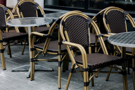 Empty restaurant summer terrace with tables and chairs. outdoor terrace. street viewの写真素材