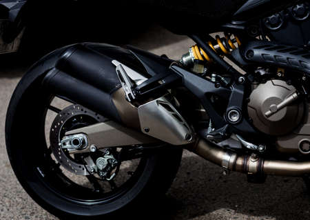 motorcycle parts. Details of a chopper. the exhaust pipe of the bikeの写真素材