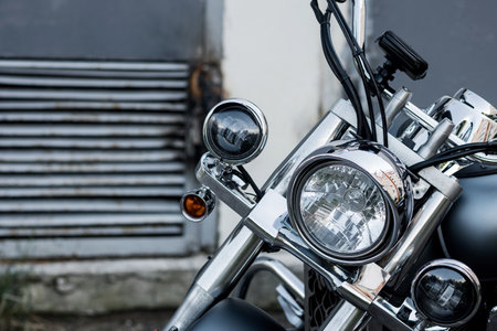 shiny chrome headlight of a classic motorcycle. vintage motorbikeの写真素材