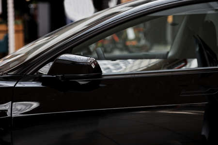 power window control panel. Car interior details of door handleの写真素材