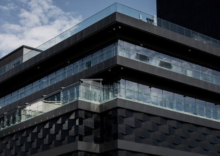 facade of a new modern multi-storey house with windows
