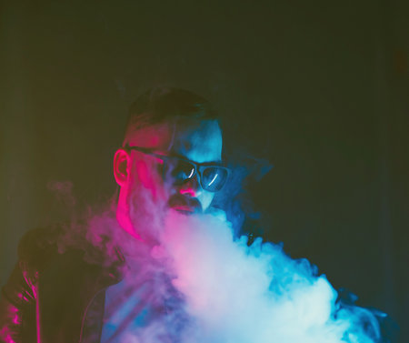 brutal man with a dangerous razor in barbershopの写真素材