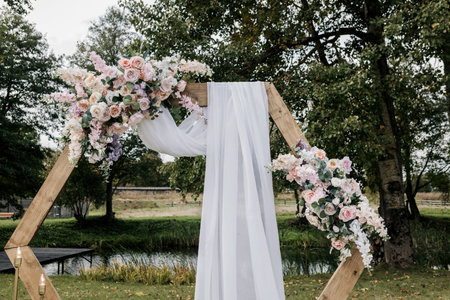 wedding ceremony decor. Wedding decoration with flowers outdoorの写真素材