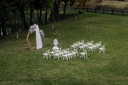 wedding ceremony decor. Wedding decoration with flowers outdoorの写真素材