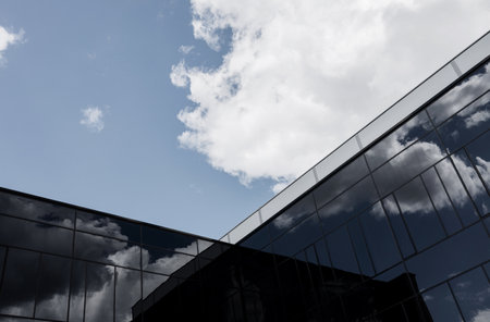 Modern office building with glass facade. glass wall of office building.の写真素材