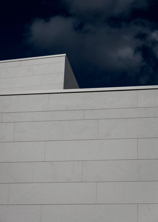 walls of the building against the blue sky. modern architecture.の写真素材