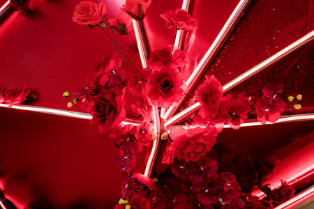 Floral decoration lamp with red artificial roses.の写真素材