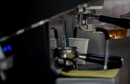 professional coffee machine. Barista preparing delicious fresh hot coffeeの写真素材