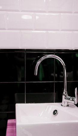 Metal faucet in a kitchen or bathroom