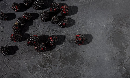 Tasty ripe blackberries on background. flat lay. Space for textの写真素材