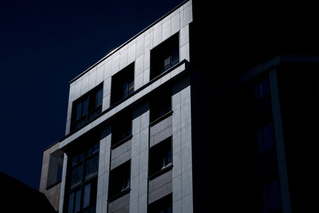 modern building against sky. urban facade. new skyscraperの写真素材