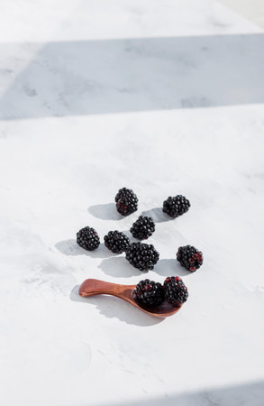 Fresh ripe blackberries on light background. natural foodの写真素材