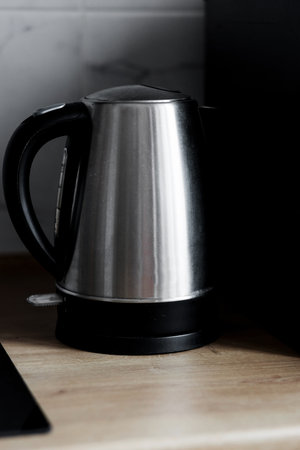 Electric stainless steel kettle on kitchen. household. Nice design of modern kettleの写真素材