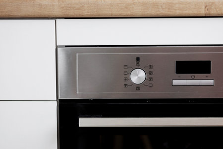 modern kitchen interior with oven. new built-in oven