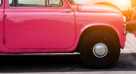 old classic car. Details of a yellow carの写真素材