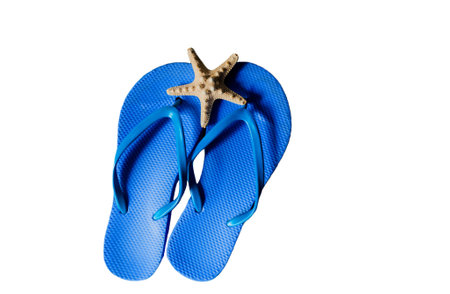 Blue beach slipper isolated on white background. top view. summer holidayの写真素材