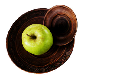 Fresh juicy ripe apple in plate isolated on white background. copy spaceの写真素材