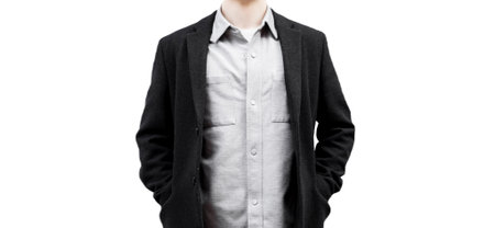 businessman in elegant coat isolated on white background. Concept of modern successful man. Handsome stylish guy wearing coatの写真素材