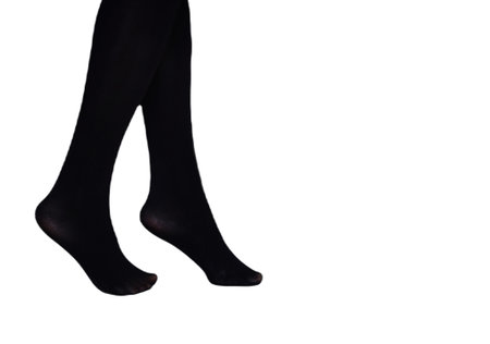 woman in black nylon tights isolated on white background . female pantyhoseの写真素材