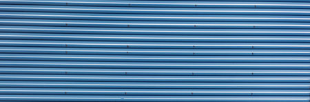 details of aluminum facade and aluminum panels with window on industrial buildingの素材