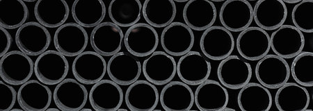 Metal pipes of the same diameter on the construction siteの素材