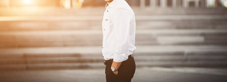 Elegant handsome businessman in shirt. fashionable man in cityの写真素材