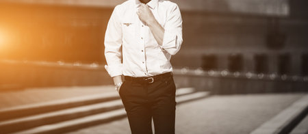 Portrait of a confident man in the city. handsome guy in shirtの写真素材
