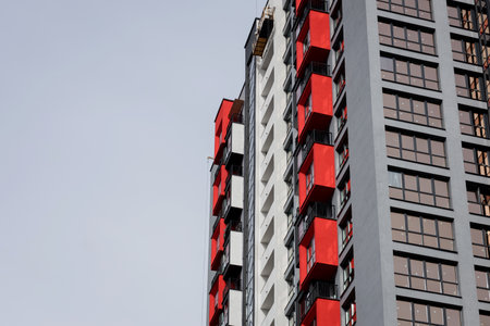 colorful apartment building on sky background. modern architecture of europeの写真素材