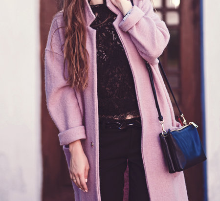 Beautiful stylish woman in coat walking in the city. fashion style.の写真素材