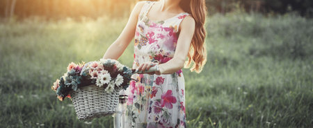Beautiful lady with vintage bike in a country road. summer conceptの写真素材