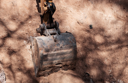 excavator bucket in work. construction and excavation worksの写真素材