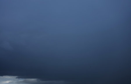 sky with storm clouds dark. storm background with cloudy before rain storms.の写真素材