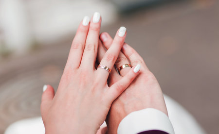 man and woman with wedding ring. metal jewelery for married couples. wedding ceremonyの写真素材