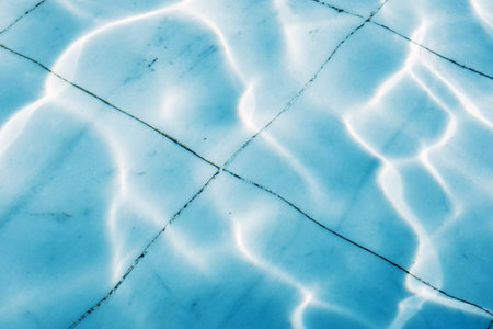 pool water background. light reflection in swimming poolの写真素材