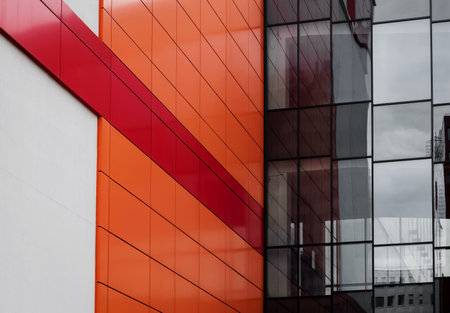 aluminum facade with red and panels on large shopping mall. new modern architectureの写真素材